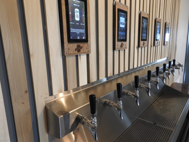 Custom beer tap in restaurant space at the newly renovated and modern commercial space, The Railyard, in Garrett, Indiana.