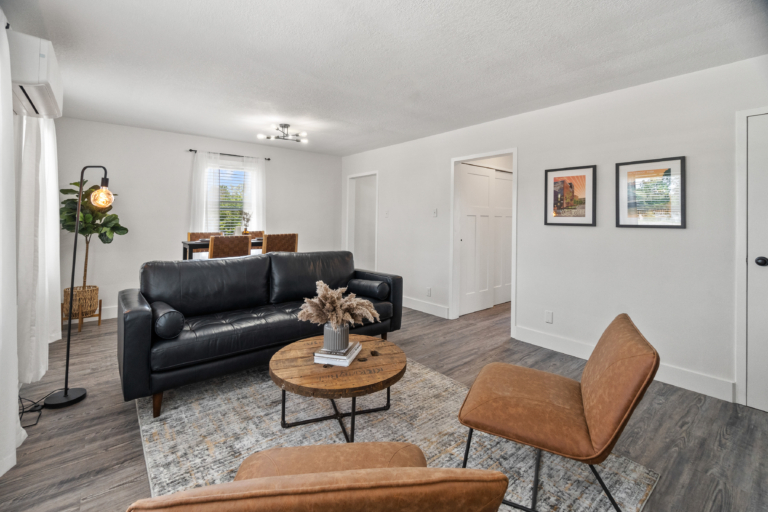 Living space view from the front door of modern and newly renovated apartment at The RIV apartments in Fort Wayne, Indiana.