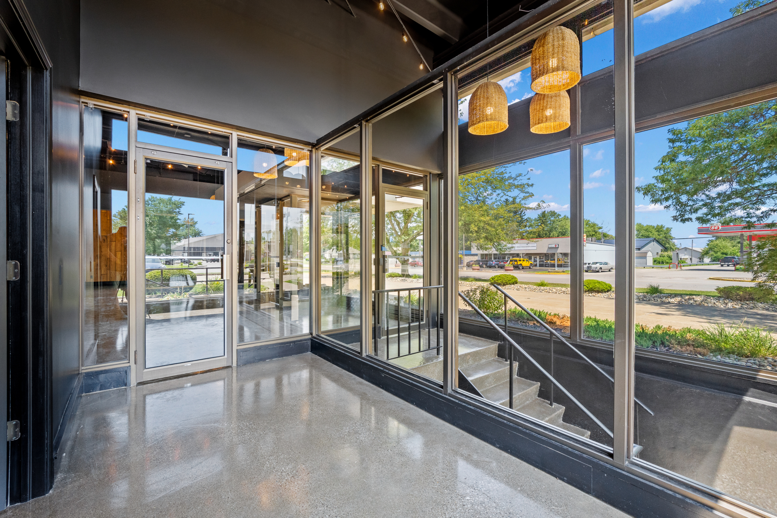 Back entrance and large windows of The Vault event center in Garrett, Indiana.